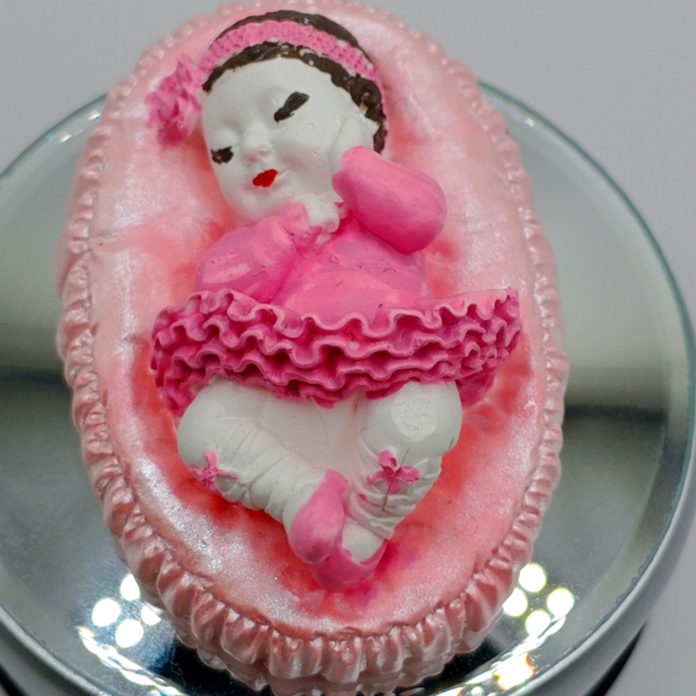 Pink and White Art Sculpture with Intricate Design